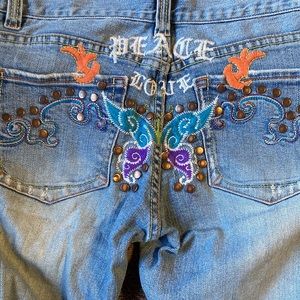 Embroidered peace love butterfly jeans